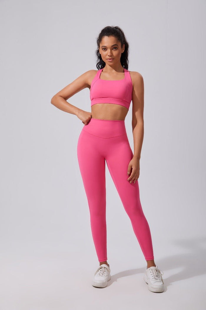 Pink yoga leggings and sports top