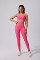 Pink yoga leggings and sports top