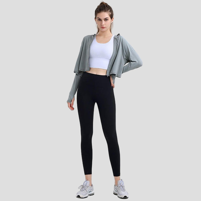 UPF 50+ Hooded Cropped Shirt and black leggings