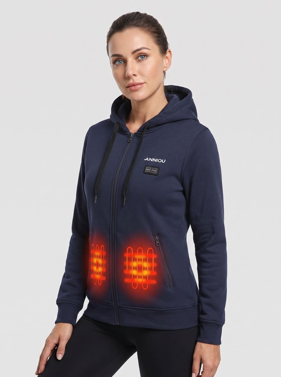 A woman wearing a navy blue zip-up hoodie with glowing orange heat-map graphics overlaid on the front pockets to indicate heating zones. The brand name 'Anniou' is printed in white on the left chest.