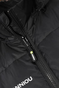 Close-up of a black puffer jacket with a white ANNIOU logo