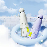 Two futuristic - looking umbrellas with a blue sky and clouds in the background