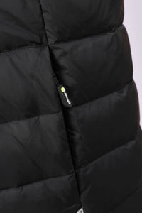 Close-up of a black puffer jacket with horizontal quilting and a small black zipper pull featuring a yellow-green dot and white 'ANNIOU' branding.