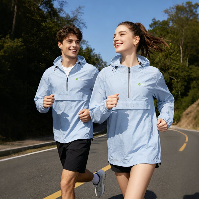 Man and woman running with a light blue Cooling Quick  drying UV Jacket