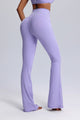 Person wearing lavender flared pants on a light gray background by Anniou