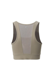Beige sports bra with mesh back on a white background
