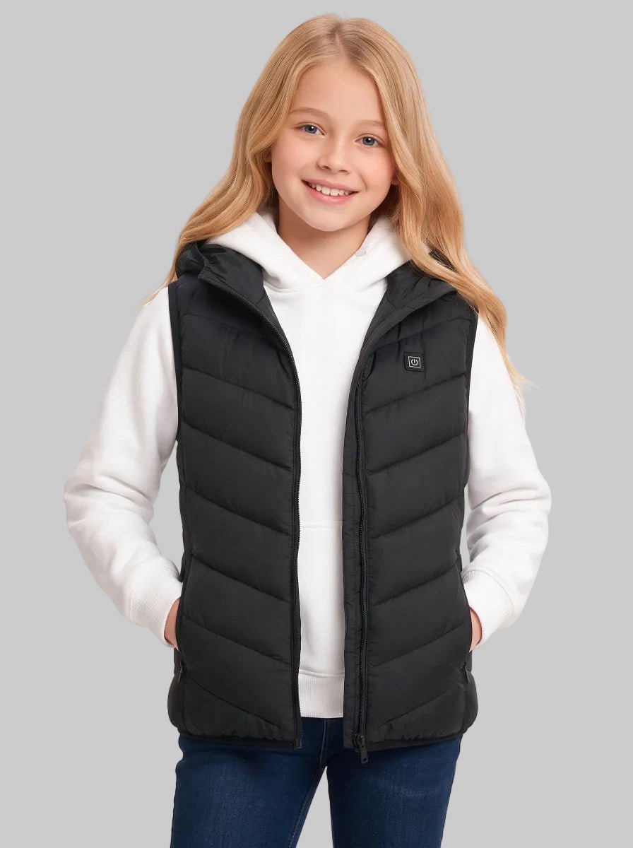 Caucasian girl hands in side pockets, black kids heated hooded vest with open zipper, inner white hoodie visible,show casual daily wearing effect of children thermal vest