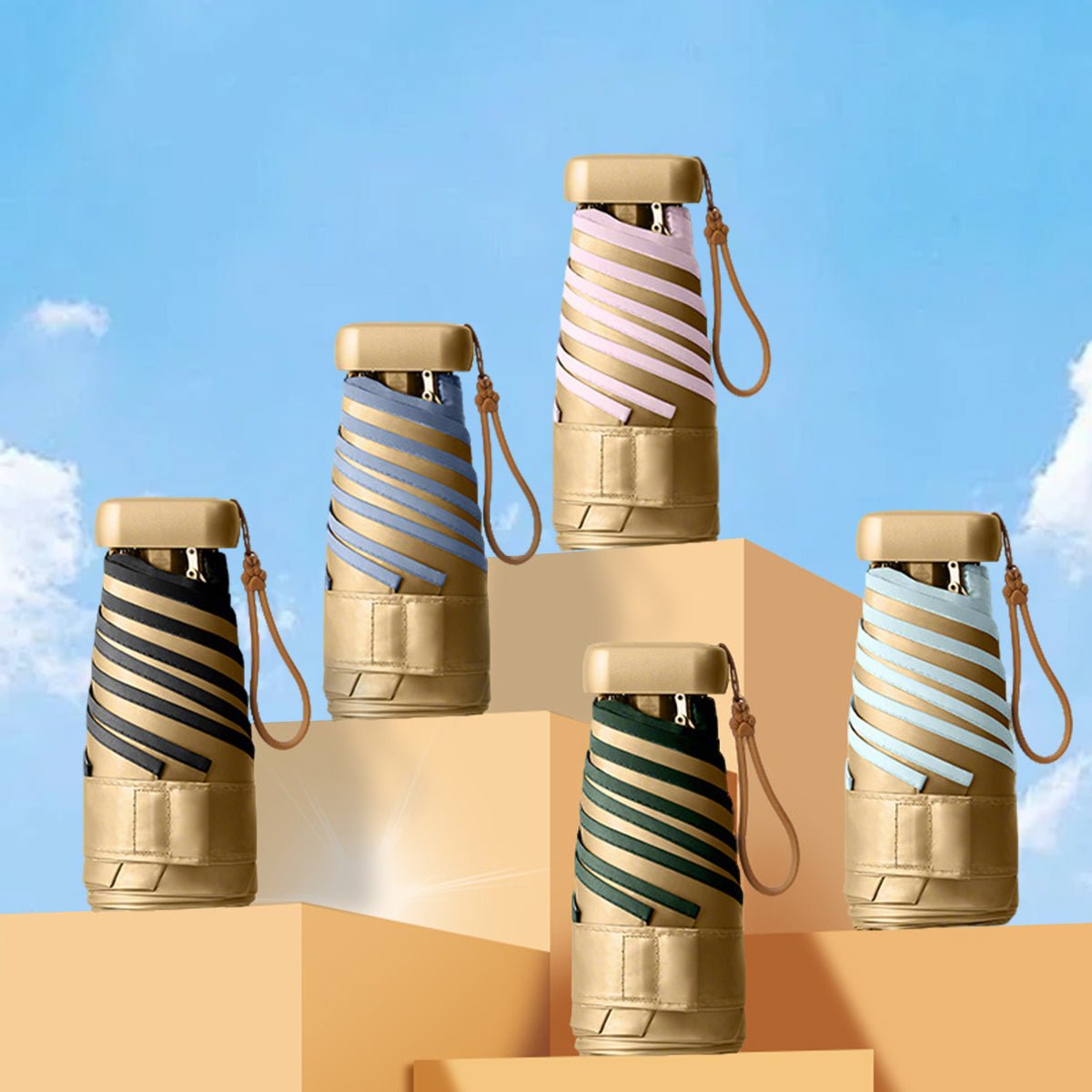Set of striped sun protection umbrellas with gold caps against a blue sky background