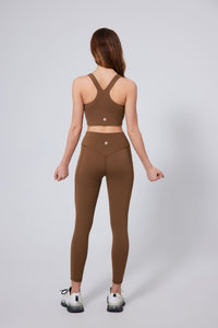 UPF 50+ Cooling brown sports bra and leggings set on a white background