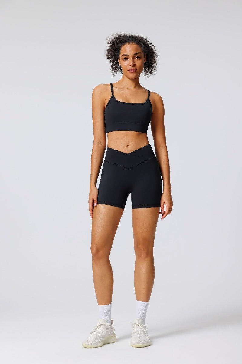 black high waist yoga shorts and sports bra