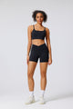 black high waist yoga shorts and sports bra