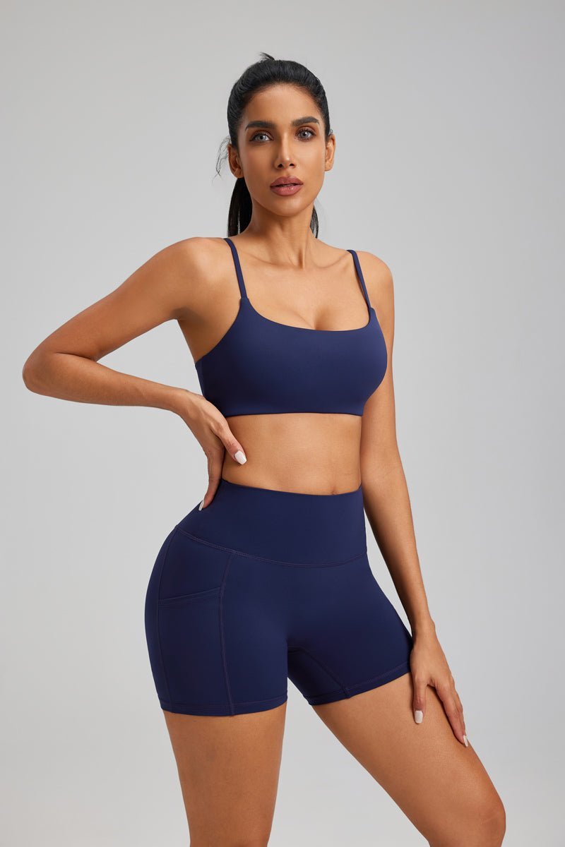 women's navy blue high waist pocket yoga shorts and sports bra set