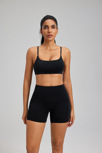 women's black high waist pocket yoga shorts and sports bra set