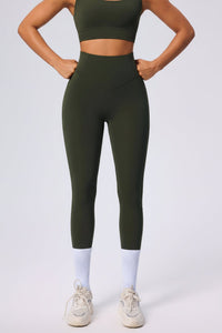 Woman wearing a green UPF 50+ yoga Leggings