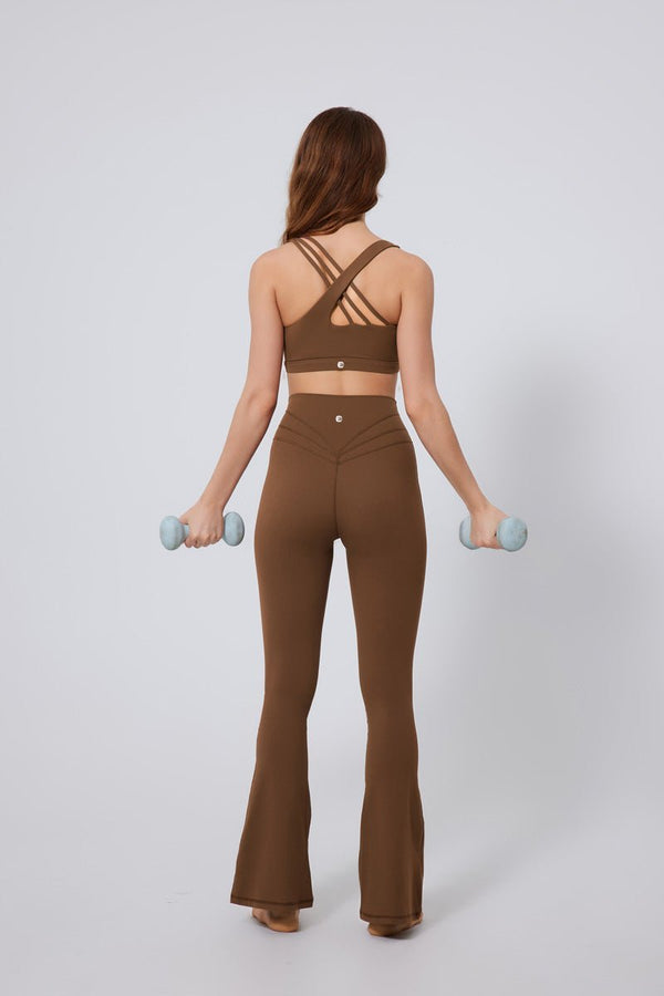 brown high waisted bootcut yoga leggings and sports bra