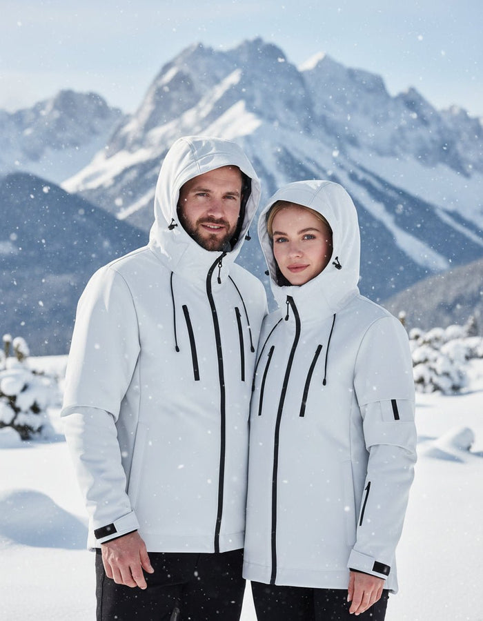 Two people wearing matching white Hooded Softshell Heated Jacket