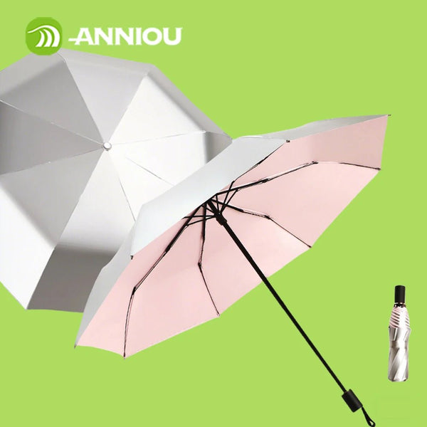 Pink compact travel umbrella with black handle and strap, white umbrella, and folded umbrella on a green background with 'ANNIOU' branding UPF 50+