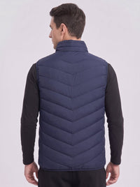 Rear of Men's 15 Zones Heated Quilted Gilet in #navy