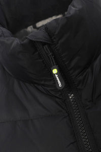 Close-up of a black puffer jacket showing the high collar, quilted fabric texture, and a black zipper pull with a small yellow-green circular logo and white 'ANNIOU' text.