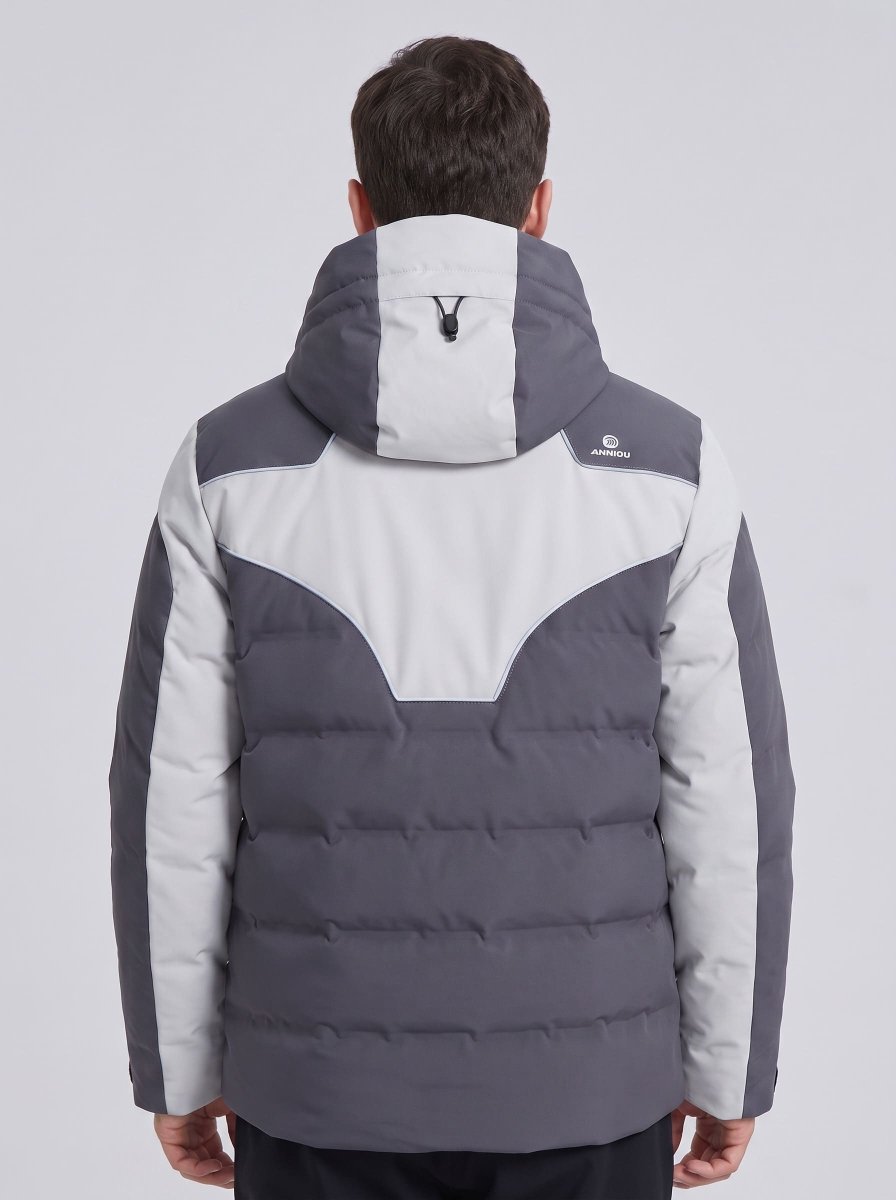 A man viewed from the back wearing a colorblock heated ski puffer jacket in dark gray and light gray, with a hood.