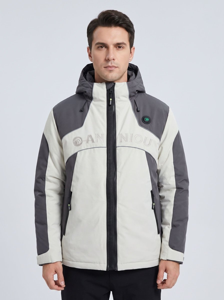 A man wearing a color-blocked hooded winter heated ski jacket in off-white and dark gray, featuring a full-zip front and a visible 'ANNIOU' logo across the chest.