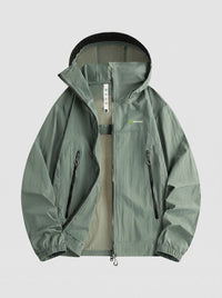 A hooded lightweight jacket in muted sage green with a black zipper and black trim, shown flat against a light gray background.