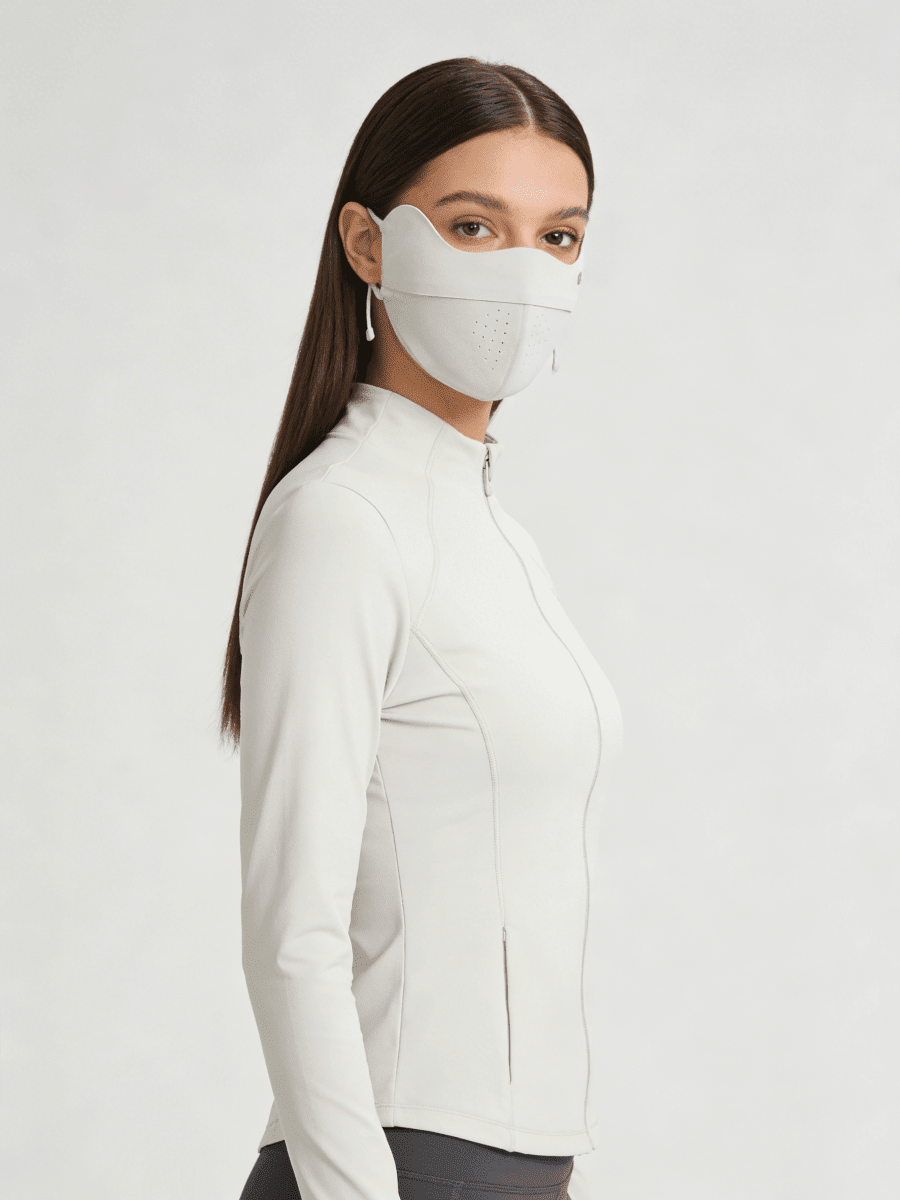 Woman wearing a Light Pink Silk Cooling UV Protection Face Mask