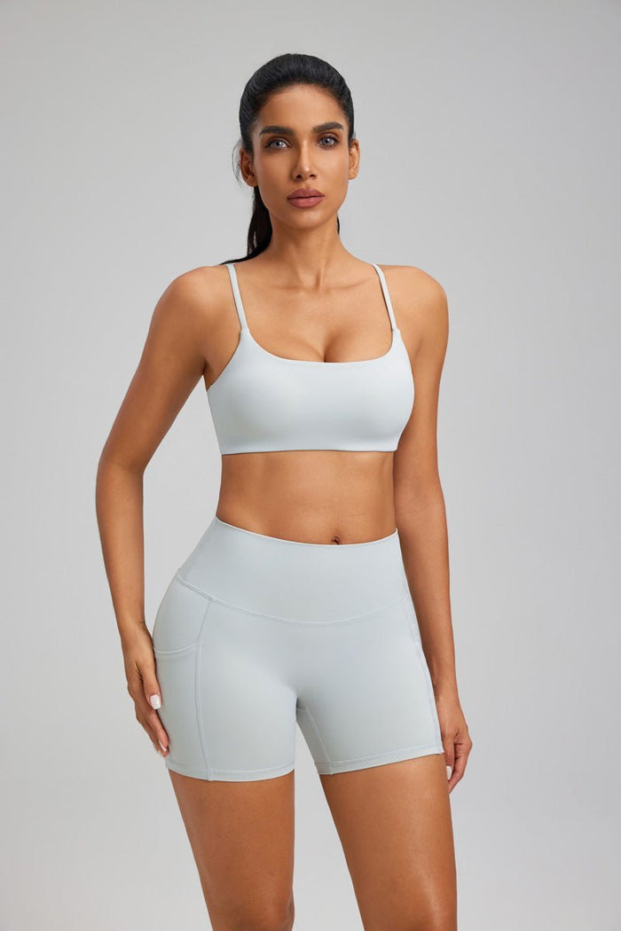 gray sports bra and high waist yoga shorts 