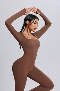 Woman wearing a brown Yoga Jumpsuit with Thumbholes