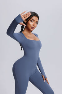 Women's UPF 50+ blue yoga jumpsuit with thumbhole