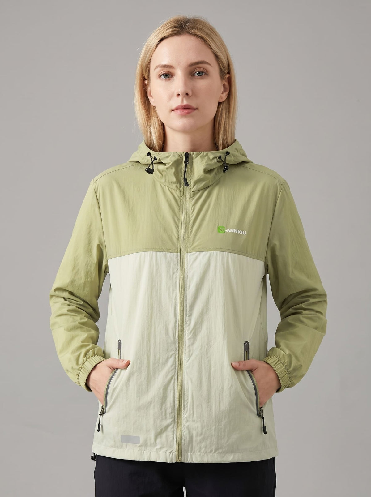 womens Apple green upf50 breathable jacket hooded zip-front jacket with a color-block design in green and off-white