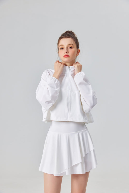 Women's white UPF 50+ high waist pleated skirt by Anniou and long sleeve sports jacket set