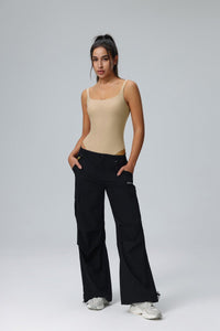 Beige Shaping Yoga Bodysuit and cargo pants