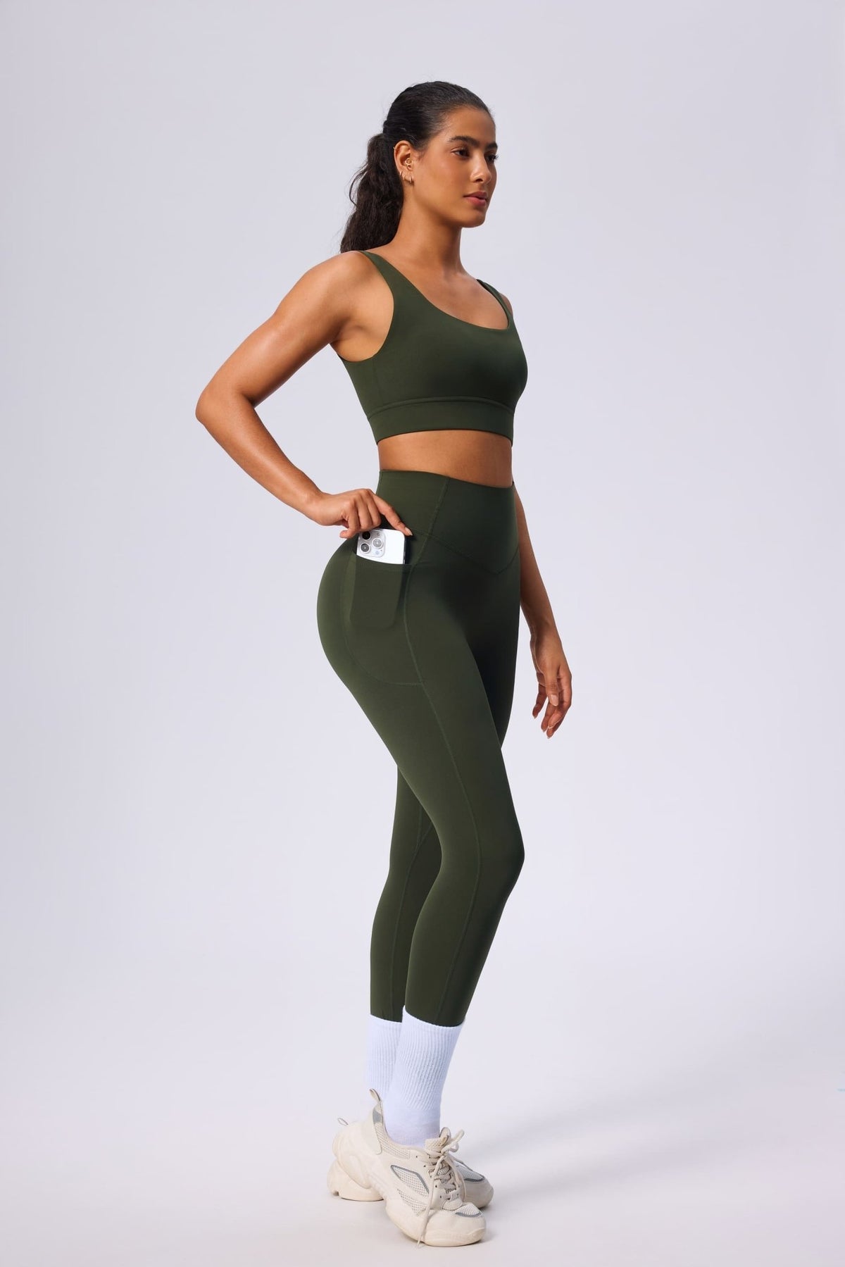 green yoga vest and leggings