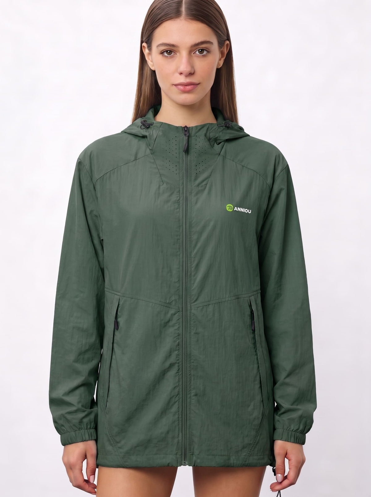 A woman wearing a dark green UV protection hooded jacket with a full front zipper and a green and white Anniou logo on the left chest, and breathable vents