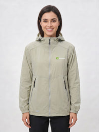 A woman wearing a light green UV protection hooded jacket with a full front zipper and a green and white Anniou logo on the left chest, and breathable vents