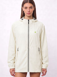 A woman wearing a white cream UV protection hooded jacket with a full front zipper and a green and white Anniou logo on the left chest, and breathable vents
