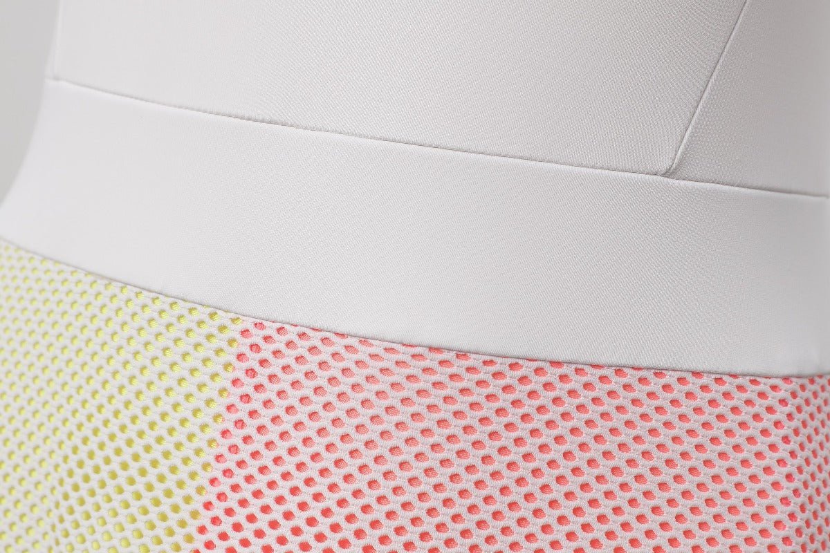 Close - up of a white dress with colorful patterned lining