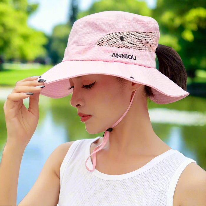 Woman wearing an Anniou Sun Protective Bucket Hat UPF 40+ in pink