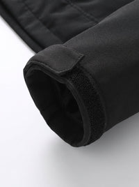 Hook and loop adjustable cuffs on heated softshell jacket
