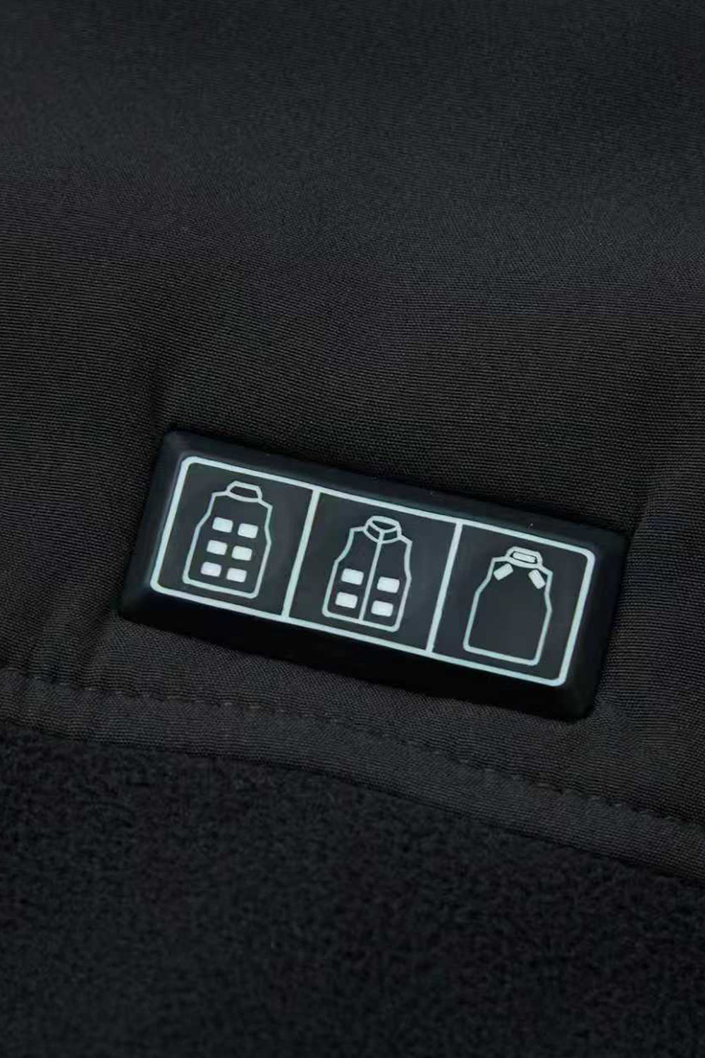 Triple control button for heated gilet