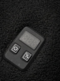 Switch detail of #black heated fleece jacket
