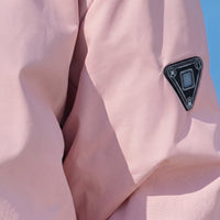 Switch button detail of #Pink Heated Softshell Jacket